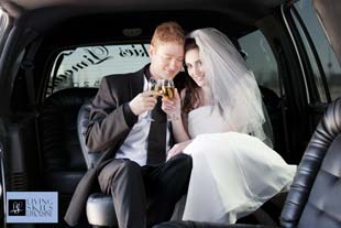 Wedding couple in limo